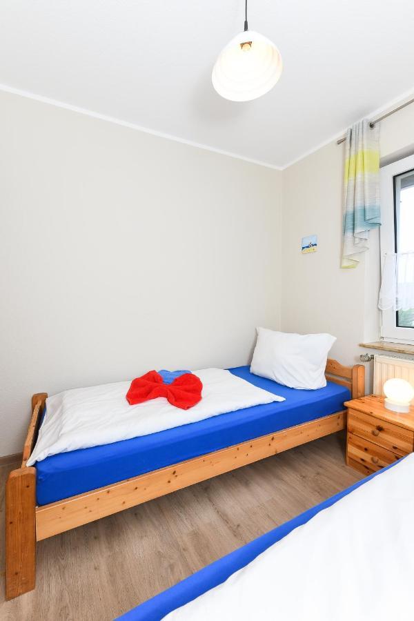 Ferienwohnung Langeoog Inselhaus Am Deich Neuharlingersiel Exteriör bild